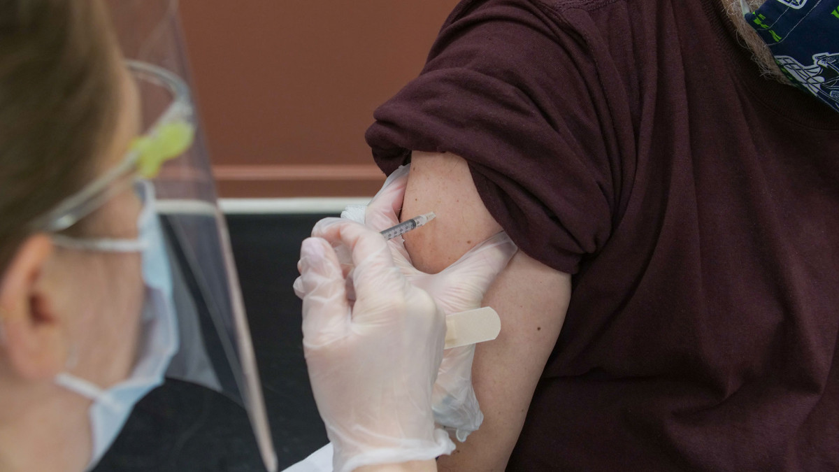 Person receiving a vaccine